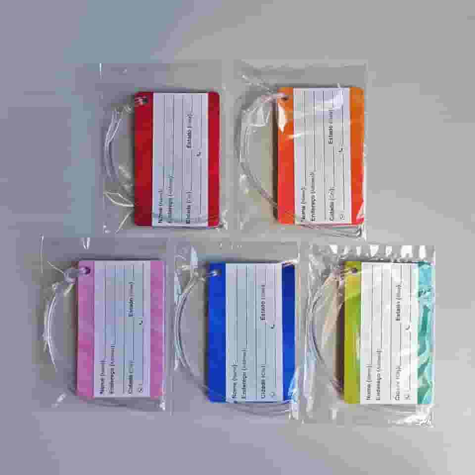 Kit com 05 Etiquetas (TAGS) PARA BAGAGEM em PVC 54x86 mm com alça em silicone transparente