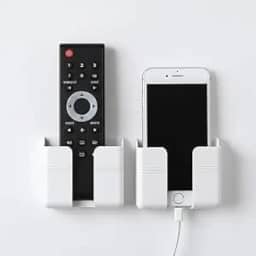 Kit com 2 Suportes de Parede para Celular ou Controle Remoto com Fita Adesiva – Ideal para Carregamento sem Furos –